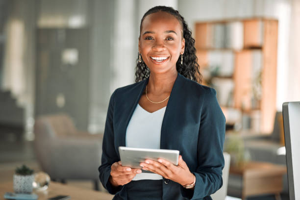 Professional using a tablet in an office